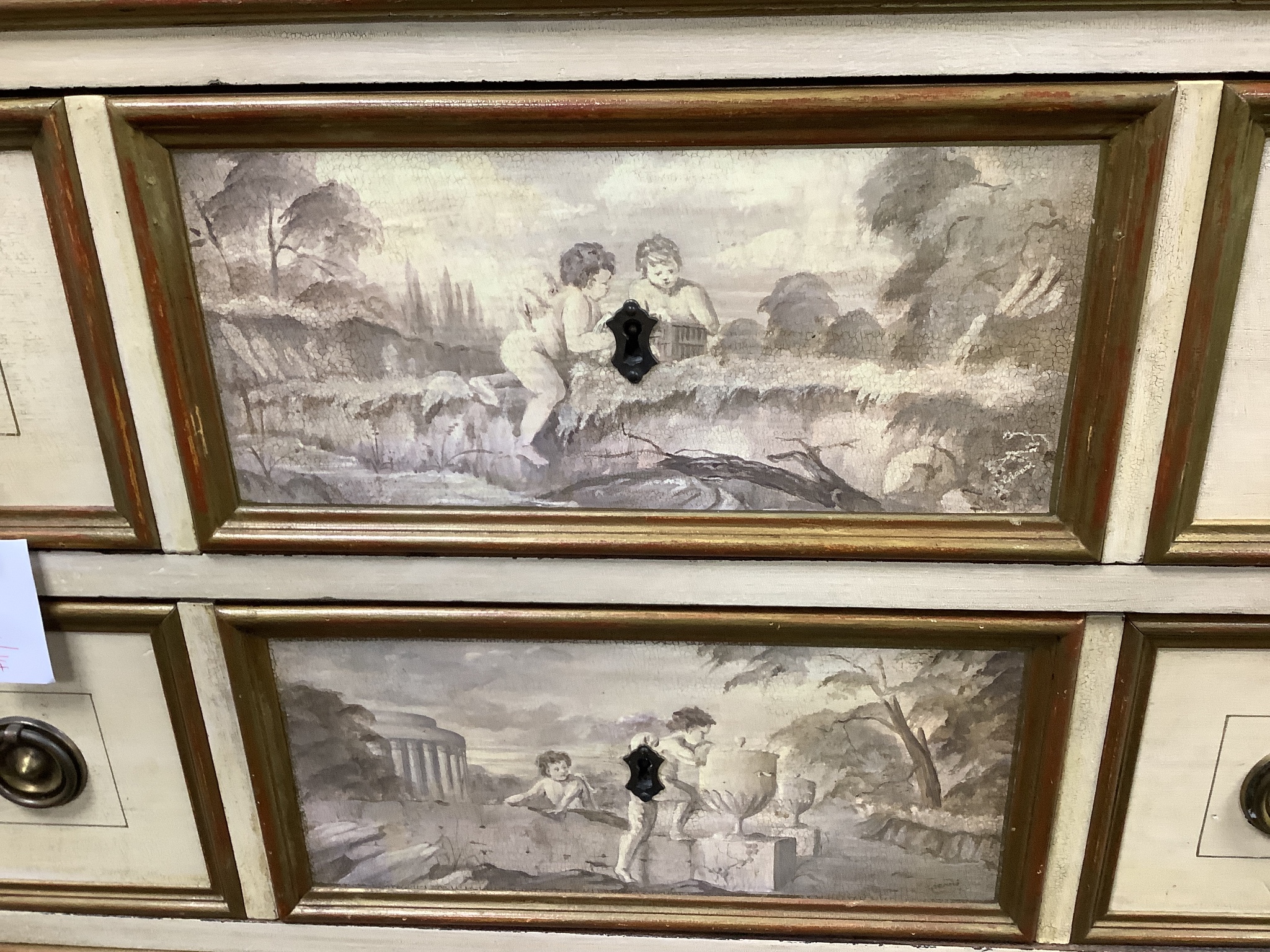 A mid 20th century Italian style painted six drawer chest decorated with cherub landscapes width 90cm, depth 45cm, height 140cm.